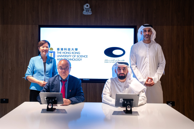 HKUST Vice-President for Institutional Advancement Prof. Wang Yang (front left) and DFF Deputy CEO Mr. Abdulaziz Al Jaziri (front right) sign the collaboration agreement under the witness of HKUST President Prof. Nancy Ip (back left) and DFF CEO HE. Khalfan Belhoul (back right).