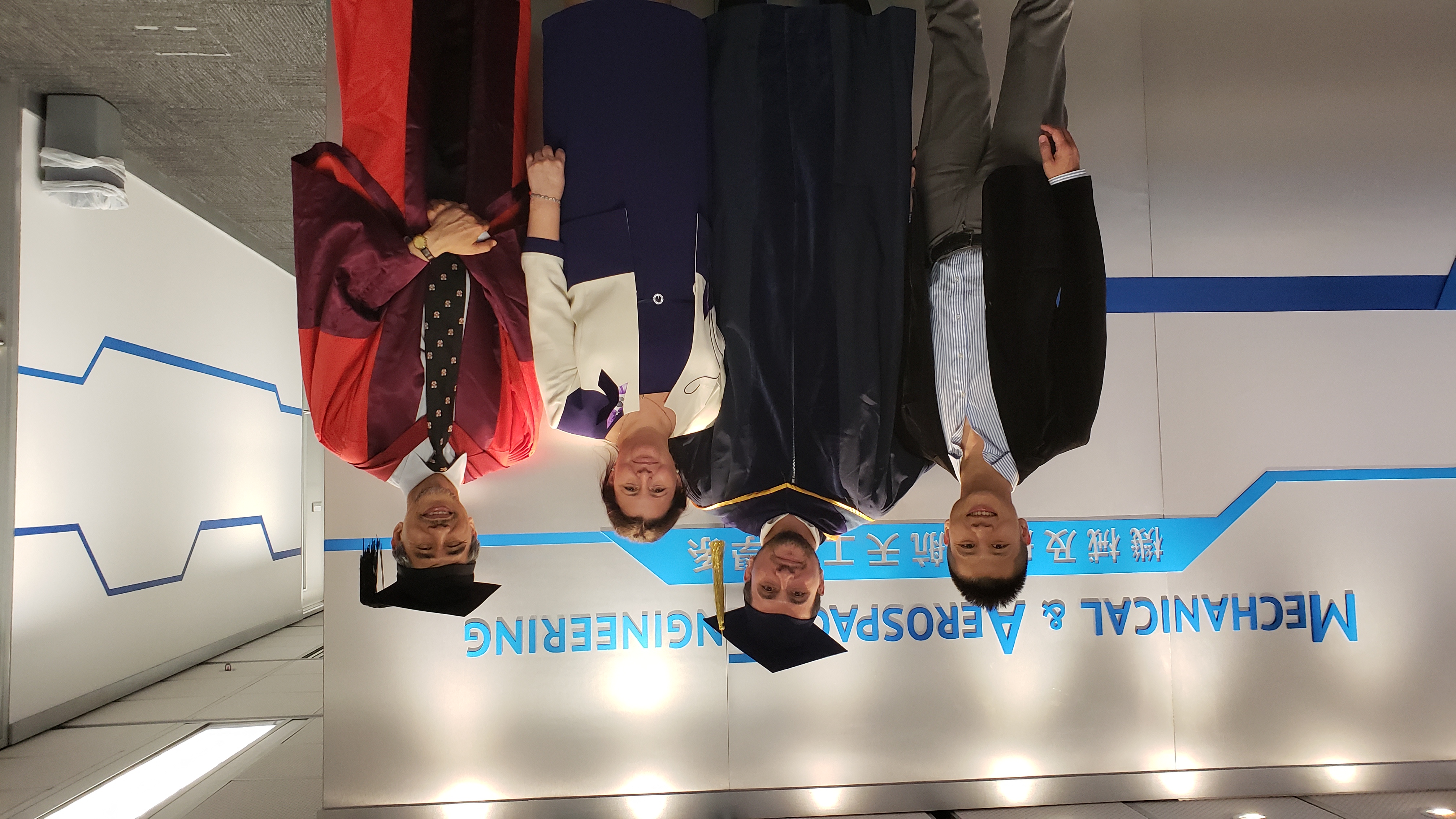 Alex (second from left) thanks with his mother (second from right) for her support to pursue his dream, and his PhD project supervisors Prof. Mathew YUEN (far right) and Prof. Robin MA (far left) for their academic guidance