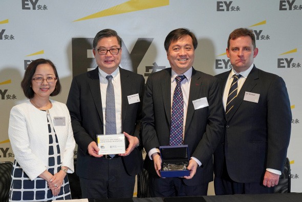 (From left) Agnes Chan, EY Managing Partner – Hong Kong & Macau; Prof. Tam Kar-Yan, Dean of HKUST Business School; Albert Lee, EY Global Tax Technology and Transformation Co-Leader and Asia-Pacific Tax Technology and Transformation Leader; and Ian MCNEILL, EY Asia Pacific Tax Deputy Leader.