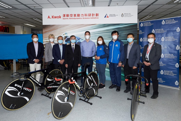 Dr. David Chung, Under Secretary for Innovation and Technology (fourth left), Mr. Adam Kwok, Executive Director of Sun Hung Kai Properties (center), Prof. Tim Cheng Kwang-Ting, Dean of Engineering (third left), and Prof. Zhang Xin, Chair Professor of Mechanical and Aerospace Engineering of HKUST (first left), Dr. Trisha Leahy, Chief Executive (second left), Dr. Raymond So, Director of Elite Training Science and Technology (first right), Mr. Shen Jinkang, Head Cycling Coach (third right), and elite cycling a