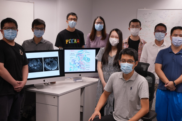 Prof. Wang Jiguang (front, seated) and his research team.