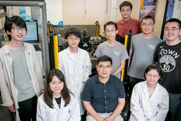 Prof. Kevin Chen (front middle) and his team that developed this work.