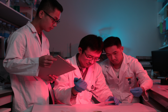 By providing laboratories and state-of-the-art equipment for the team to carry out experiments and tests, HKUST seeks to aid early-stage entrepreneurs. From left: Yang Zhongguang, Wang Ri, and Wong Ka-Chin.