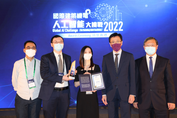 Prof. Wang Zhe (second left) and PhD student Guo Mingyue (center) received three awards at the ceremony on Sept 23, 2022. Also pictured are Prof. Sun Dong, Secretary for Innovation, Technology and Industry (second right), Mr. Eric Pang, Director of Electrical and Mechanical Services (first right), and Mr. Alex Lee of Tencent Cloud (first left).