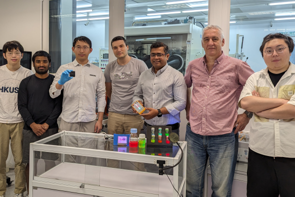 Dr. Kang Chengbin (3rd left) is holding a white LED and Prof. Abhishek Srivastava (3rd right) with a set of QRLED prototypes in his hand and various monochromatic quantum rods on the table. Other co-authors are Liao Zebing (1st left), Kumar Mallem (2nd left), Dr. Maksym Prodanov (center), Dr. Valerii Vashchenko (2nd right) and Song Jianxin (1st right).