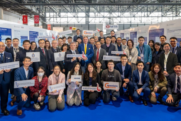 Mr. David Taji Farouki (in bright blue suit), President of the Jury of the International Exhibition of Inventions Geneva, takes a picture with all the HKUST delegation members, including Associate Vice-President for Research & Development (Knowledge Transfer) Dr. Shin Cheul Kim (2nd row, 3rd left) and Dean of Engineering Prof. Hong K. Lo (2nd row, 7th left), and the official representative of Hong Kong for the Exhibition Ir Andrew Young (2nd row, 5th left), Associate Director (Innovation) of Sino Group.