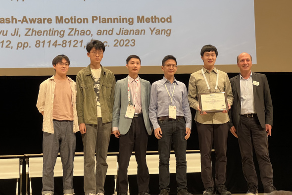 Prof. Shen Shaojie (third right), his current PhD students Jiang Chenxing (first author, second right), Liu Peize (first left) and Yu Zehuan (second left), and former PhD student Dr. Zhou Boyu (third left) received an IEEE Robotics and Automation Letters Best Paper Award at the IEEE International Conference on Robotics and Automation 2024.