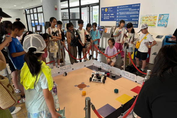 Children had fun controlling the robot designed for The Robot Explorer Cup, one of the major competitions hosted by GCE.