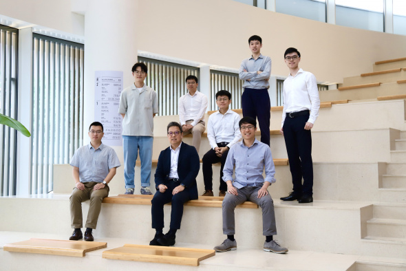 Dean of Engineering Prof. Hong K. Lo (front row, center) and his research team members