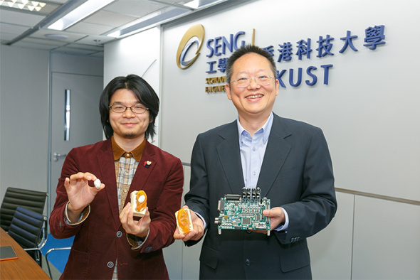 Prof Richard So (right) and Calvin Zhang showcase the research outcome of their audio technology.