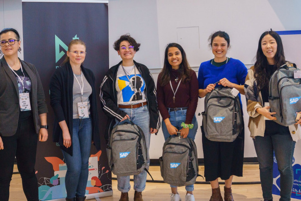 Mashiat Lamisa (third right) and her teammates Ilana Zimmerman (second right) and Dama Correch (third left) received the Empower Women Through Technology Prize at the cmd-f all-female* hackathon held at the University of British Columbia.
