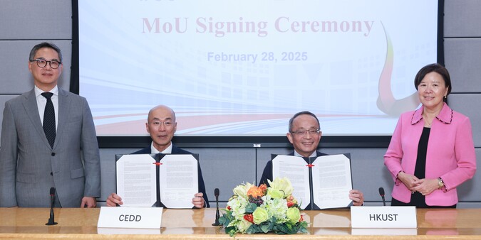 The Hong Kong University of Science and Technology (HKUST) and The Civil Engineering and Development Department (CEDD) sign a Memorandum of Understanding (MoU) on research studies related to sustainable infrastructure development and land formation. Photo shows the Vice-President for Research and Development of HKUST, Prof. Tim Cheng (second right), and the Director of Civil Engineering and Development, Mr. Michael Fong (second left), signing the MoU as witnessed by the President of HKUST, Prof. Nancy Ip (f