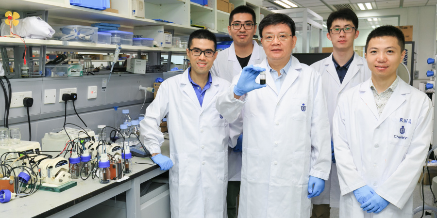 Prof. Zhao Tianshou (middle) and Prof. Chen Qing (first from left) and their research teams. 