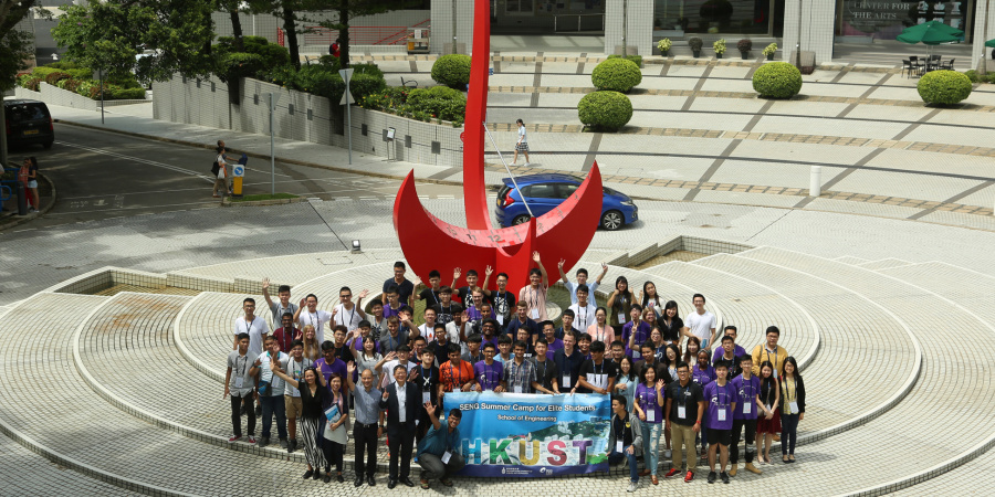 The camp participants, together with the School's faculty, staff and student helpers, pose for a picture by the sundial at the HKUST Entrance Piazza.	 