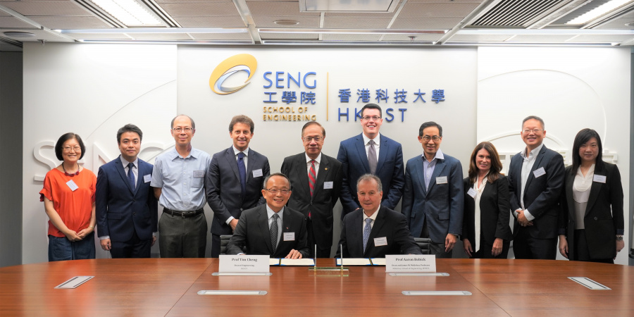HKUST Dean of Engineering Prof. Tim Cheng (front left) and James M. McKelvey Prof. Aaron Bobick, WashU Dean of McKelvey School of Engineering (front right), sign the MoU under the witness of the WashU delegates and HKUST representatives.