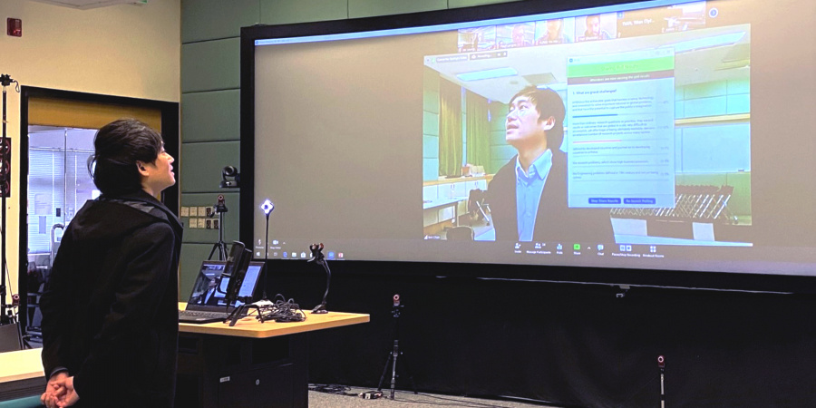 Prof. Ben Chan Yui-Bun, Director of the Center for Engineering Education Innovation, immersed in HKUST’s specially designed mixed reality classroom, which offers many novel ways to teach and learn online and on-site and is a first for Hong Kong.