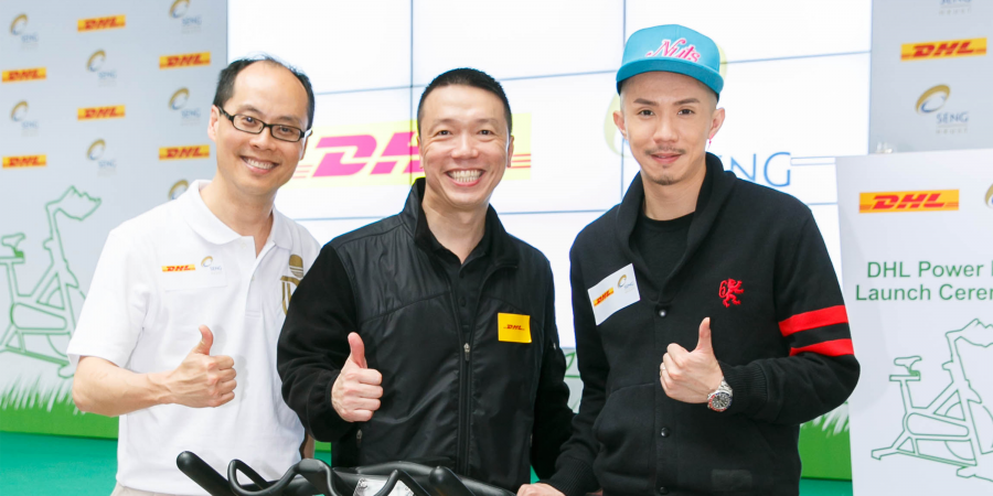 Ken Lee, Head of Commercial, Asia Pacific and Managing Director, Hong Kong and Macau, DHL Express (Middle), together with Prof Roger Cheng, Associate Dean of Engineering, HKUST (Left) and artist Louis Cheung (Right) unveil the DHL Power Bike.