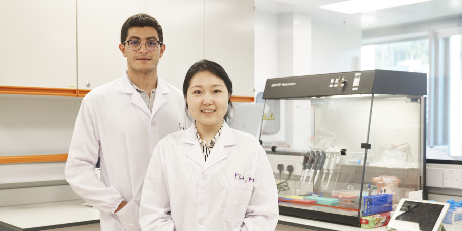 HKUST bioengineering PhD gradates Dr. Lu Xiao (right) and Dr. Alan Rodriguez in their laboratory in the Hong Kong Science and Technology Park