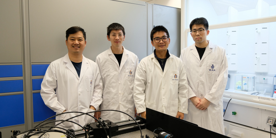 Prof. Zhou Yanguang (second right) and his PhD students Fan Hongzhao (first left), Wang Guang (second left) and Li Jiawang (first right)