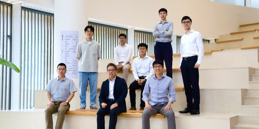 Dean of Engineering Prof. Hong K. Lo (front row, center) and his research team members