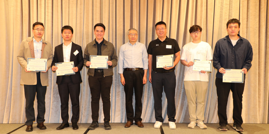 Mr. Zhenyu Liang (third from left) receiving his best conference paper award
