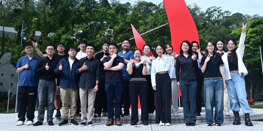 Prof. Terence Wong (front row, fifth left) and students in the Department of Chemical and Biological Engineering