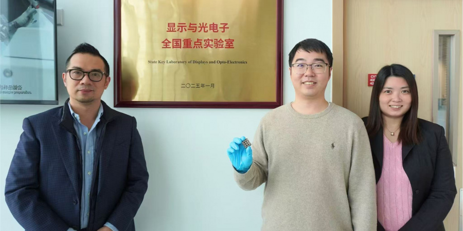 Dr. Shen Xinyi (center) holds his certified all-vacuum-deposited perovskite solar cell with Prof. Lin Yen-Hung (left) and Dr. Fion Yeung (right).