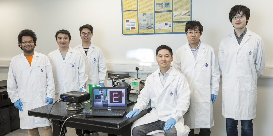 The team has successfully made the prototype of the “super human eye” – an artificial visual system that uses a spherical biomimetic electrochemical eye with hemispherical retina made of a high-density perovskite nanowire array. From left: Swapnadeep Poddar, Shu Lei, Zhang Daquan, Prof. Fan Zhiyong, Dr. Gu Leilei and Long Zhenghao.