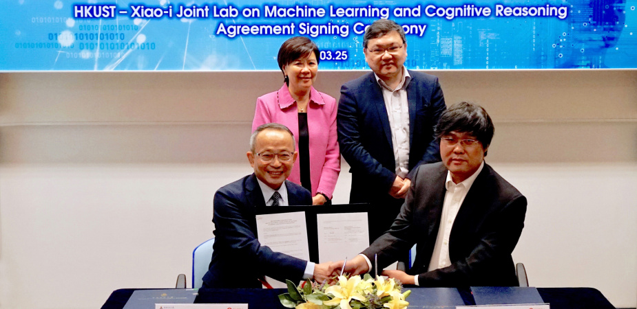 Prof. Tim CHENG Kwang-Ting (front left), HKUST Dean of Engineering, and Mr. Arlene CHEN (front right), Xiao-i's VP and Head of Research Institute sign the agreement under the witness of Prof. Nancy IP Yuk-Yu (back left), Vice-President for Research and Development of HKUST and Dr. ZHU Pinpin (back right), Xiao-i’s Founder and Chief Executive Officer.