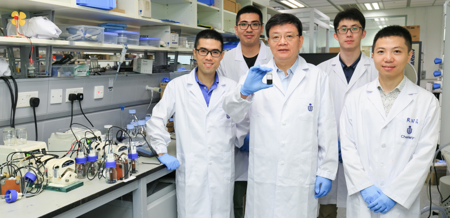 Prof. Zhao Tianshou (middle) and Prof. Chen Qing (first from left) and their research teams. 