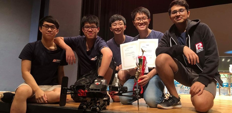 The winning team: (from left) Mak Ka-Hei, Leung Pok-Man, Mak Kin-Wing, Lee Chun-Hei and Amrutavarsh Sanganabasappa Kinagi, with their autonomous biped robot in front