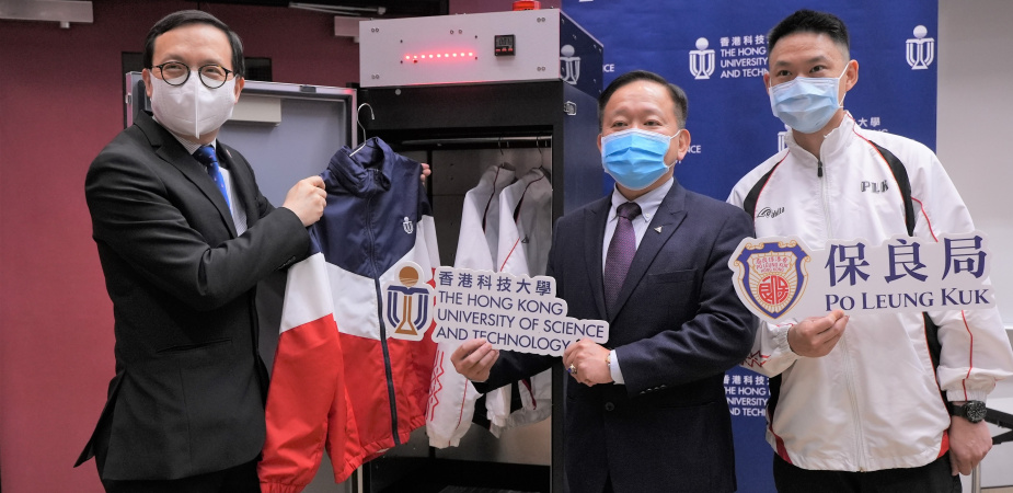 Prof. Ricky LEE Shi-Wei (middle), Chair Professor of the Department of Mechanical and Aerospace Engineering at HKUST, demonstrates how the UVC LED disinfection closet works, along with Mr. LAM Kwok-Wai (left) and Mr. Martin MAK, Principal and Assistant Warden respectively of the Po Leung Kuk Yu Lee Mo Fan Memorial School.