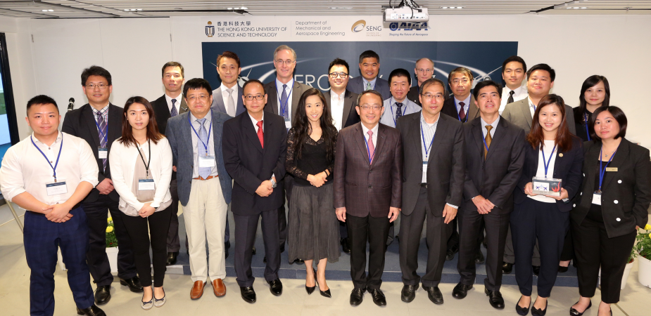 Representatives of participating companies and professional institutions in the aviation industry pose for a photo after souvenir presentation by Swire Professor of Aerospace Engineering Prof Xin Zhang (3rd from left, front row), Chair Professor of Mechanical and Aerospace Engineering, also with Ms Candy Nip (6th from right, front row), Principal Assistant Secretary for Transport and Housing (Transport), Prof Tim Kwang Ting Cheng (5th from right, front row), Dean of Engineering, and Prof Christopher Chao (1