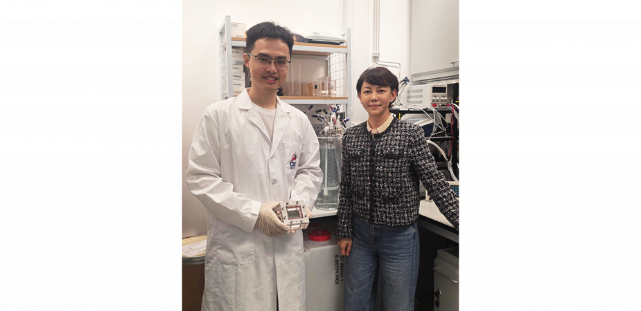 Prof. Alicia An (right), Professor in the Department of Chemical and Biological Engineering and the study’s corresponding author, together with her postdoc Dr. Sun Jiawei (left), the study’s first author, who is holding a membrane module, are pictured beside a desalination system.