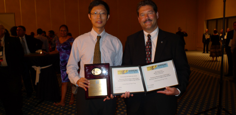 Prof Fugee Tsung (left) with the certificates of the three prestigious awards and Dr Lincoln Forbes, President of IIE, at the Industrial Engineering Research Conference in Cancun, Mexico