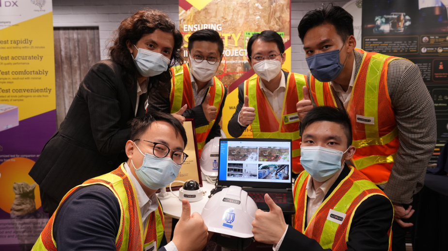 AutoSafe leverages smart technology to modernize and automate worksite safety monitoring while improving efficiency. The start-up team comprising Issac Leung, co-founder (first left, back row), Prof. Jack Cheng (second right, back row), and Peter Wong, co-founder (first right, front row), was awarded championship in the HKUST-Sino One Million Dollar Entrepreneurship Competition.