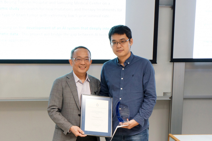 Prof. WANG Ji-guang, Assistant Professor of Chemical and Biological Engineering, was presented the Young Investigator Research Award by Prof. Tim CHENG Kwang-Ting, HKUST Dean of Engineering.