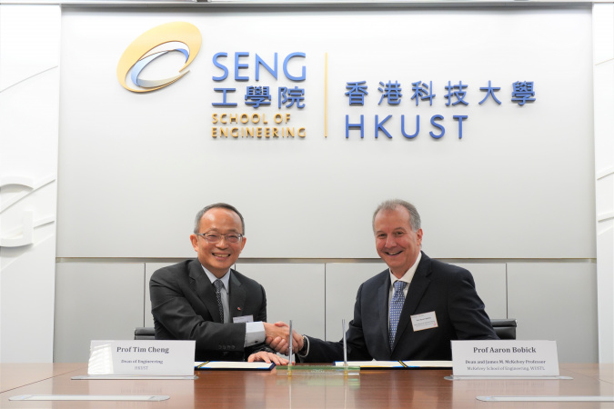 Prof. Tim Cheng, HKUST’s Dean of Engineering (left), and James M. McKelvey Prof. Aaron Bobick, WashU Dean of McKelvey School of Engineering, sign the memorandum of understanding to establish a framework within which cooperation may develop between the two institutions.