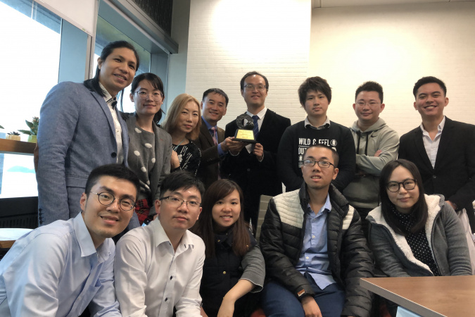 Prof. Gary Chan (fourth left, back) with Mr. Arthur Chan (fourth right, back) and the Compathnion team.
