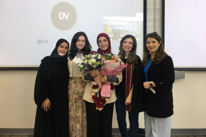 Karama (right) believes that her satisfaction as a team leader stems from the achievements of her team and her students. She celebrates the successful defense of a team member’s PhD degree. 