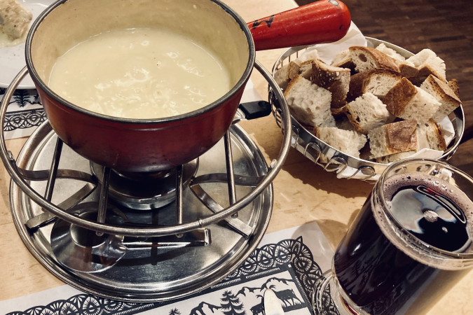 The classic, national dish, cheese fondue. Typically eaten with bread, potatoes or meats, the cheese(s) are melted with white wine and served on a special pot, called caquelon.