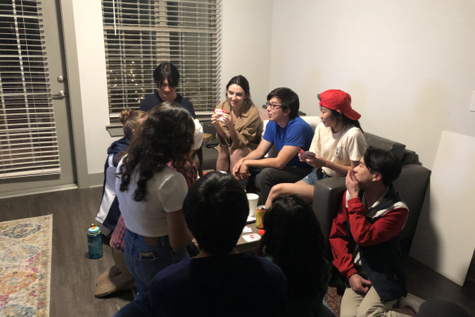 A casual meeting with other members of the GTIA. I took this picture because we were playing some card games together and everyone looks so cute in that picture
