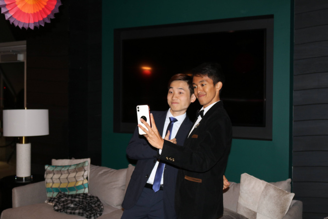 My friend Ferris and I were taking a selfie in the prom, and someone took a picture of us. I loved this picture because as a new member of the GTIA, Ferris helped me a lot in catching up and we had a great time together.
