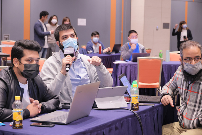 (From left) PhD students Syed Awais Wahab Shah (Electronic and Computer Engineering), Muhammad Waqar, and Muhammad Zeshan Akber (both from Civil and Environmental Engineering) at the competition workshop in December 2021.