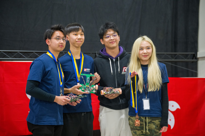 A team of four students built three robots and made a clean sweep of the gold, silver and bronze medals in the NatCar event.