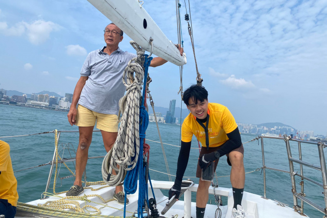 After completing the inaugural HKUST Sail and Shine Program, Rico (right) served as a “teaching assistant” to Andy (left) in the second cohort, providing guidance to other participants.