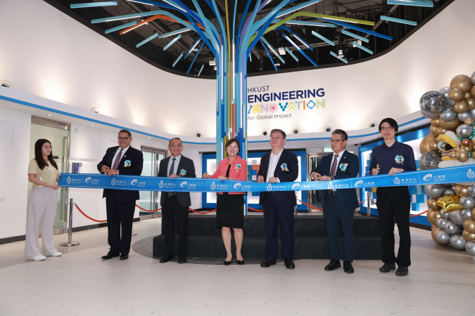 Ribbon-cutting by officiating guests in front of the Innovation Tree at the foyer marked the official opening of the Engineering Commons. The word T-R-E-E is an acronym for Transforming Research into Engineering Excellence.