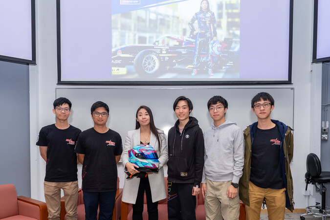 Miss Vivian Siu (third left), Louis Cheng (third right), Marco Leung (second right) and other members of the Red Bird Racing Team