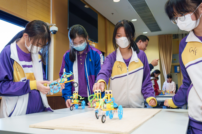 Participants raced against each other using their electric tricycles.