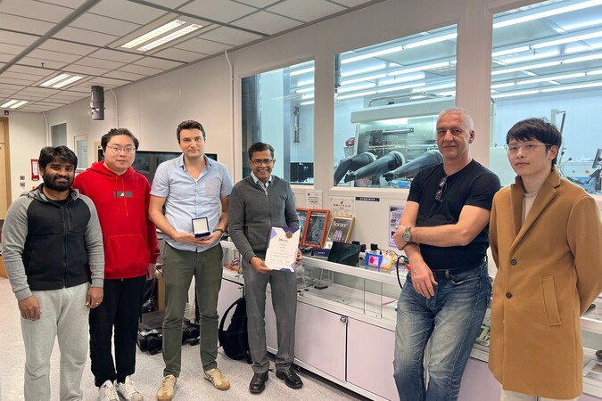 One of the Gold Award teams at the 4th Asia Exhibition of Innovations and Inventions Hong Kong: Prof. Abhishek Srivastava (fourth left), Dr. Maksym Prodanov (third left), Dr. Valerii Vashchenko (second right), and their team members, from the Department of Electronic and Computer Engineering